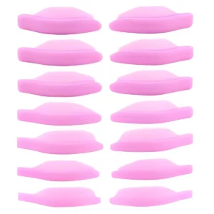 Pink Katya Vinog lash lift shields arranged in rows, showcasing their hybrid design for effective, durable lash lifts