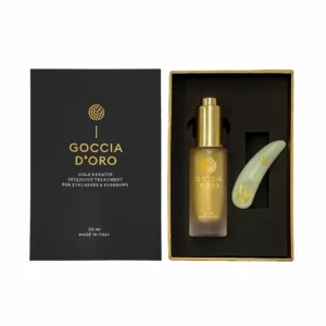 Goccia D'Oro Gold Keratin Intensive Treatment kit for eyelashes and eyebrows, featuring a 30ml serum bottle and a crystal spoon for application, packaged in a sleek black box