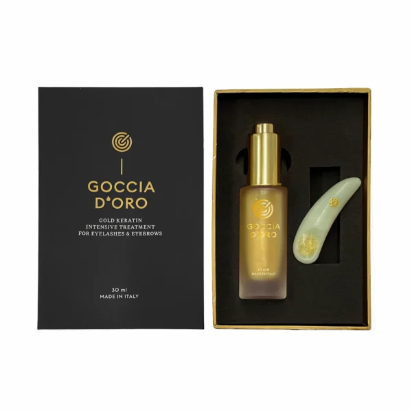 Goccia D'Oro Gold Keratin Intensive Treatment kit for eyelashes and eyebrows, featuring a 30ml serum bottle and a crystal spoon for application, packaged in a sleek black box