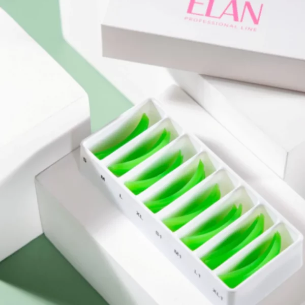 ÉLAN Lash Lift Silicone Shields in labeled tray, assorted sizes S to XL, for professional lash lifting treatments in sleek white packaging
