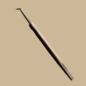 Permalift Original Isolator Tool in beige with precision angled tip, designed for accurate lash separation during professional lash lift treatments