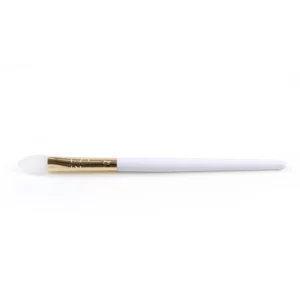 Kensi Cosmetics silicone brush with a white pointed applicator tip, gold ferrule, and white handle, ideal for precise product application