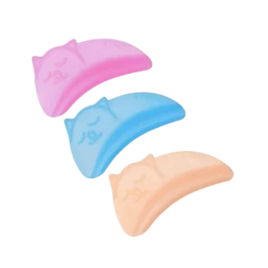 Three lash lift shields in pink, blue, and peach with playful cat face imprints, providing flexibility and comfort for bottom lash lifts