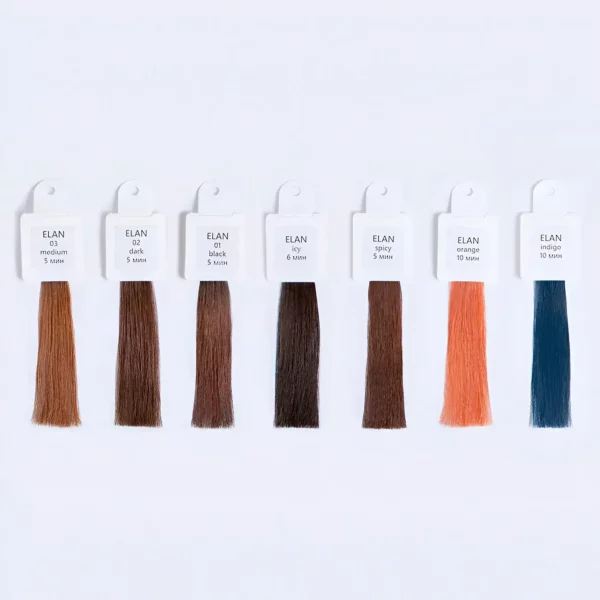 Élan Eyebrow Tint Colour Booster shade samples displayed in a row, including Medium, Dark, Black, Icy, Spicy, Orange, and Indigo tones