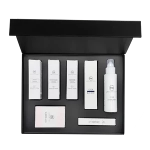 My Lamination Lash Lift Starter Kit in open black box with creams, serum, adhesive, color developer, and silicon pads.