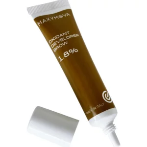 Maxymova Brow Oxidant Developer 1.8% tube with cap removed, professional brow developer for tint mixing and colour activation.