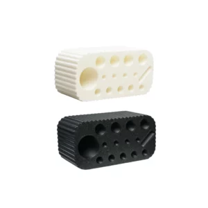Katya Vinog LamiMaker Mini Stand in black and white with multiple tool holes and slots for organizing lash lift and brow lamination accessories.